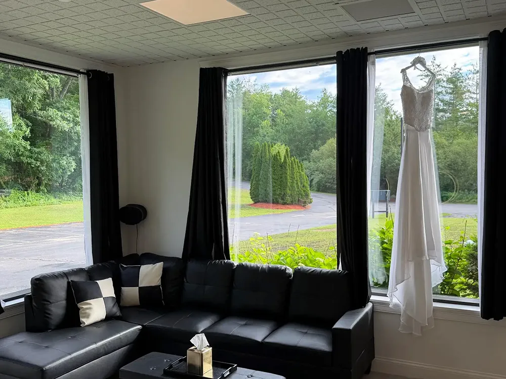 dark leather corner count sites in a room with large windows overlooking the venue